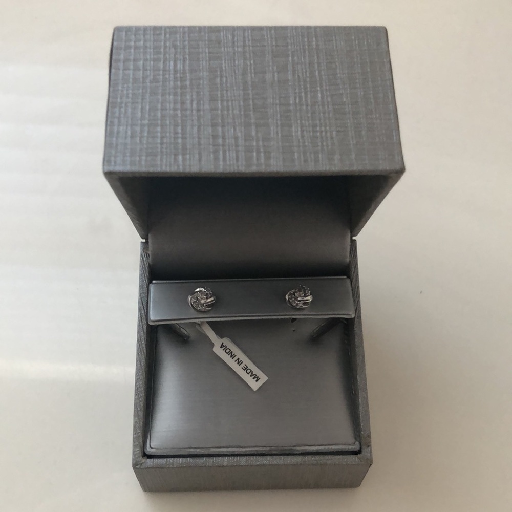 1/8 CT. T.W. Diamond Love Knot Stud Earrings in 20K White Gold - Picture 2 of 5